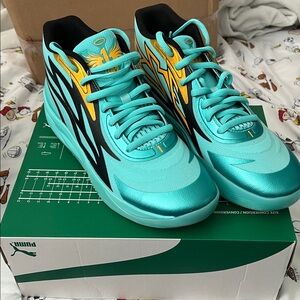 Puma Turquoise and Gold High-Top Sneakers